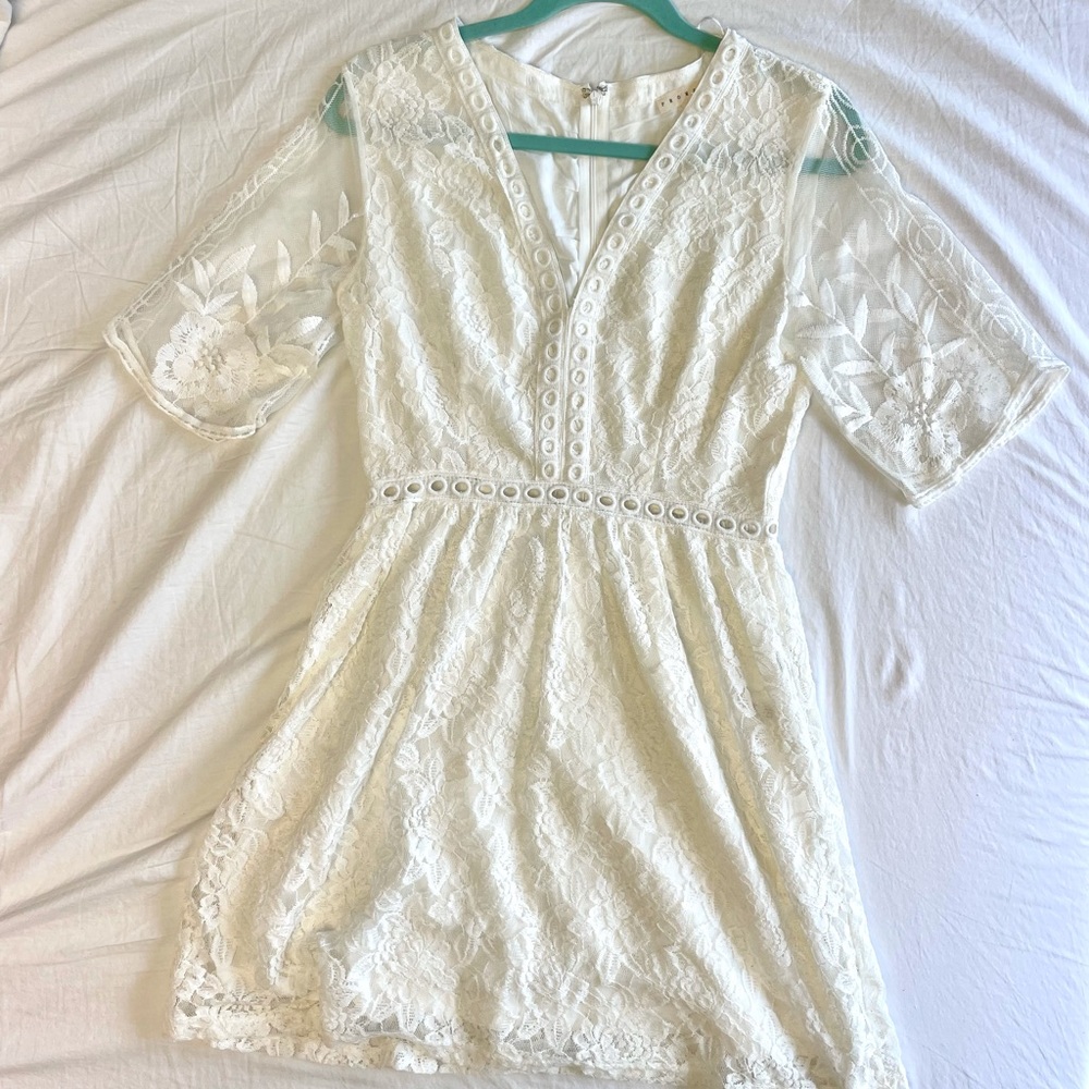 Lace sleeve embroidered white dress